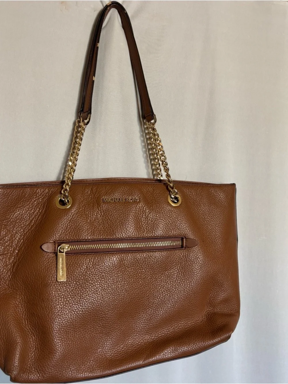 Michael Kors Cognac Pebbled Leather Tote with Gold Chain Straps zipper closure
